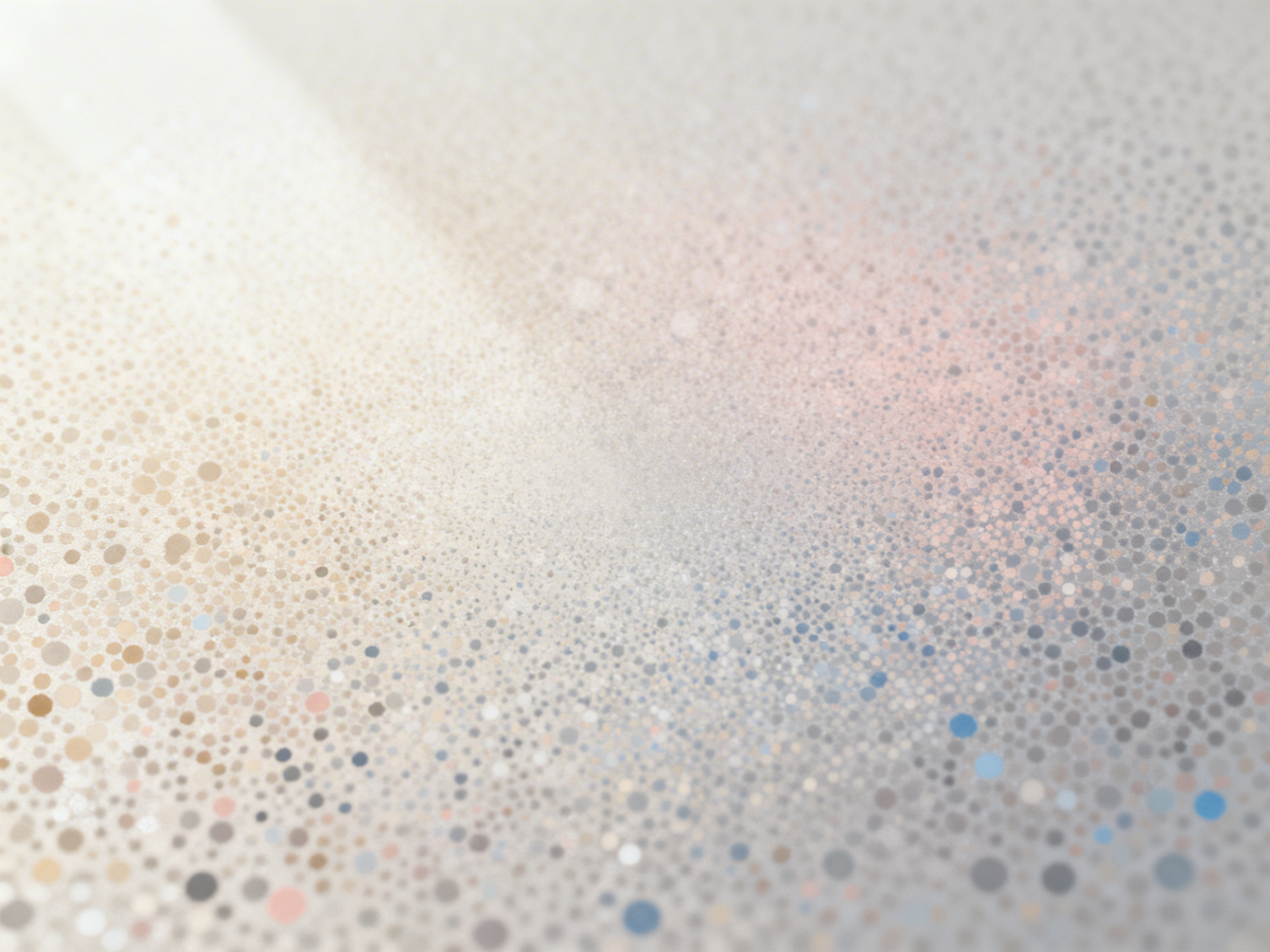 图中展示了一张极具抽象感的微距风格背景。画面由无数细小的圆形颗粒组成，这些颗粒密密麻麻地分布在平面上，呈现出一种类似磨砂玻璃、水汽凝结或精细喷绘的质感。色调温润且柔和，左侧被一股明亮的暖白色光晕笼罩，仿佛有侧光照射，使得左侧的颗粒呈现出淡金色和浅米色；右侧则逐渐过渡到冷色调，包含浅灰、淡蓝和微弱的粉紫色点缀。整体构图采用了浅景深效果，画面顶部和底部的颗粒较为模糊，视觉焦点集中在中心偏左的光影交汇处。作为 AI 生成的图像，其缺陷在于颗粒的分布逻辑略显机械，缺乏自然界中水滴或沙粒那种随机的物理堆叠感，部分区域的颗粒边缘出现了不自然的像素化粘连，且光影的来源在透视上显得有些平面化，缺乏真实空间的深度感。
