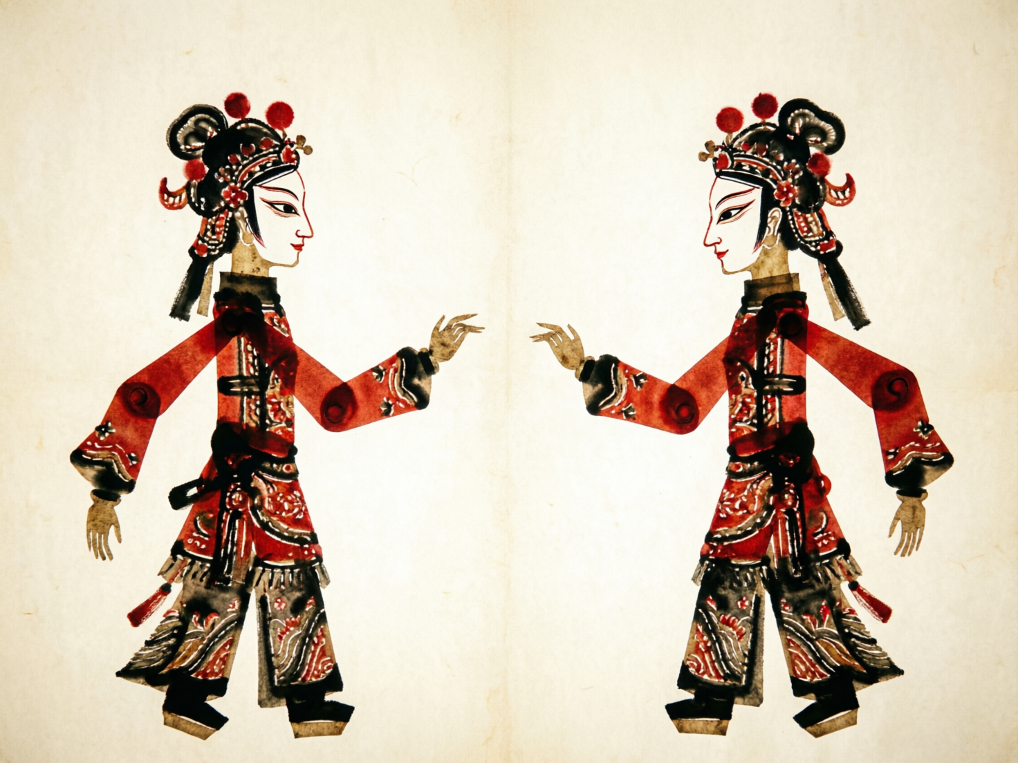 图中展示了两个对称排列的中国传统皮影戏人物，背景是带有古旧质感的米黄色宣纸。这两个人物均为女性旦角形象，侧脸相对，仿佛正在进行对话。她们头戴精致的红色绒球头饰，身穿红黑相间的繁复戏服，服饰上布满了细腻的镂空花纹。人物的肢体由明显的关节圆点连接，体现了皮影戏可活动的结构特征。整体色调以朱红、墨黑和古铜色为主，呈现出浓郁的民间艺术风格。

然而，画面中存在明显的 AI 生成缺陷：最显著的是两个人物的手部结构异常，手指数量不正确且形状扭曲，呈现出不自然的尖锐感，缺乏皮影雕刻应有的利落线条。此外，左右两个人物几乎是完全的镜像对称，这在手绘或手工雕刻的皮影作品中极少见。人物服饰上的纹样在细节处显得模糊且逻辑混乱，左右关节的连接位置也略有不对称，透出一种数字合成的僵硬感。