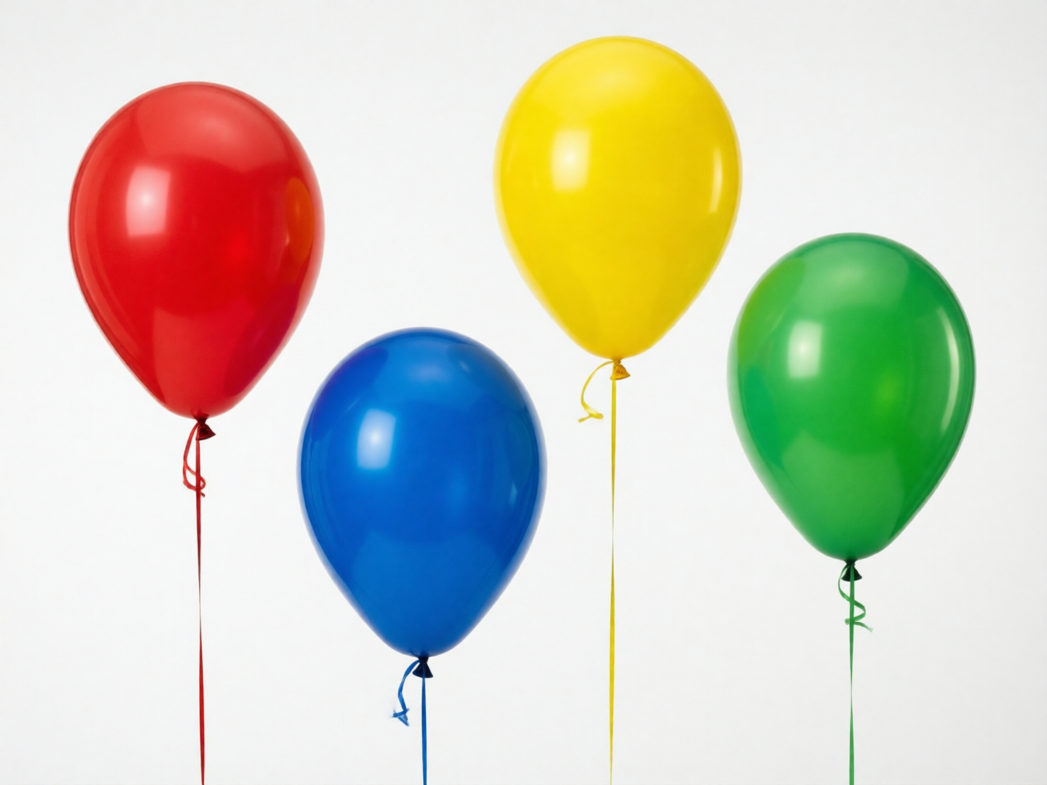 图中展示了四个色彩鲜艳的充气气球，在纯白色的背景下呈高低错落的排列。从左到右，气球的颜色依次为大红色、深蓝色、明黄色和草绿色。每个气球表面都有明显的白色反光点，营造出一种光滑、具有弹性的质感。每个气球底部都系有一条与其颜色相匹配的细长丝带，丝带垂直向下延伸，画面整体构图简洁明快，色彩饱和度高。

在 AI 生成的细节方面，画面存在一些明显的逻辑缺陷：首先，气球底部的丝带连接处显得不够自然，部分丝带像是凭空悬浮或直接穿过了气球的充气口，缺乏真实的打结物理结构。其次，最左侧红色气球和最右侧绿色气球的丝带在靠近气球的位置出现了不规则的卷曲，但这些卷曲与下方笔直下垂的丝带在受力表现上并不协调。此外，蓝色气球底部的丝带末端显得有些破碎和模糊，与整体清晰的轮廓略有出入。